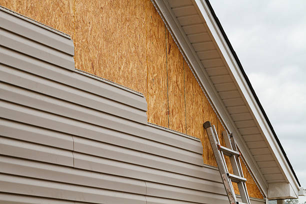 Professional Fiber Cement Siding technician working in Towson, MD